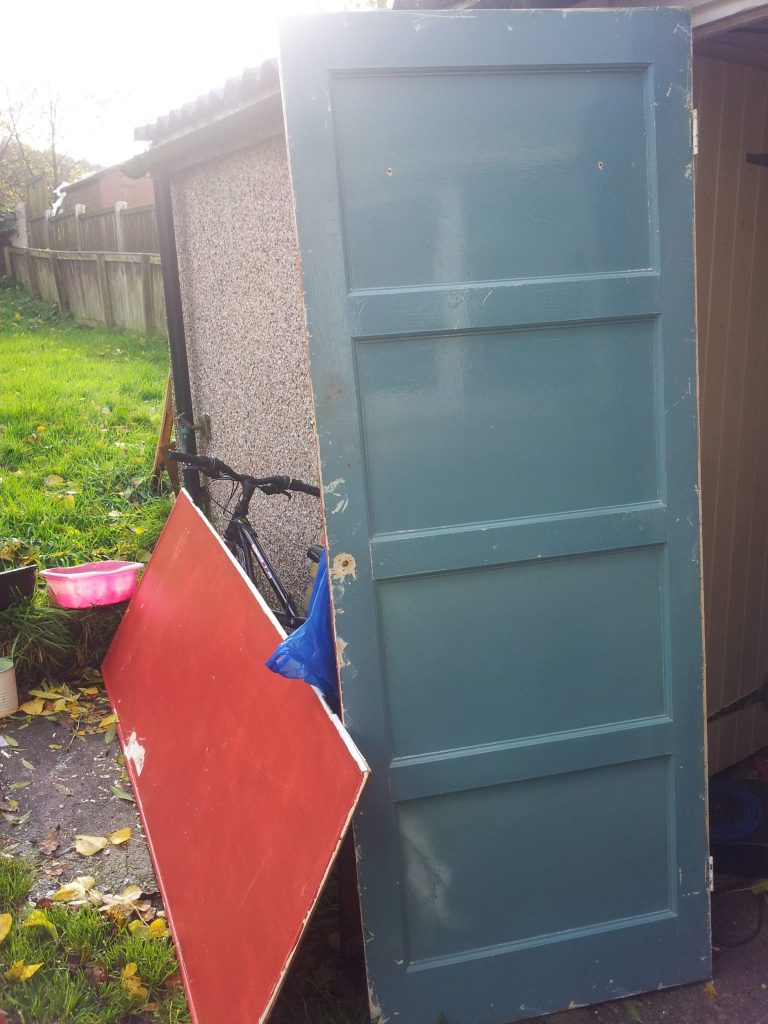 One of the 1950s panel doors that were revealed under sheets of hardboard.