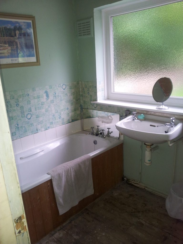 Our bathroom, before we gutted and renovated it. Want to see what it looks like now?