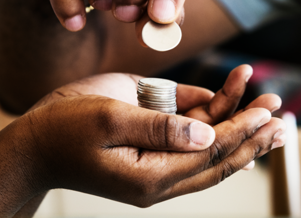 Hands receiving coins | A Penny Saved In January 2019