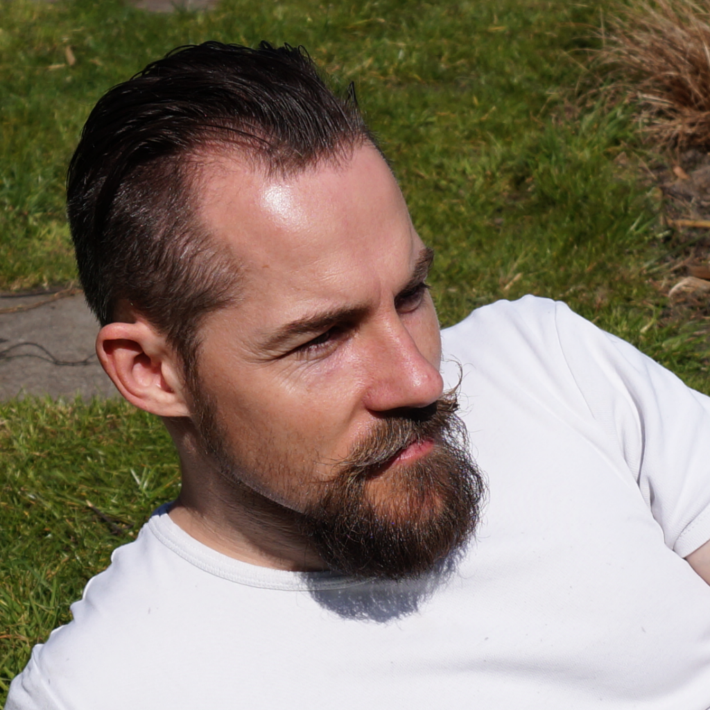 Ste's handlebar moustache shaped with homemade moustache wax.