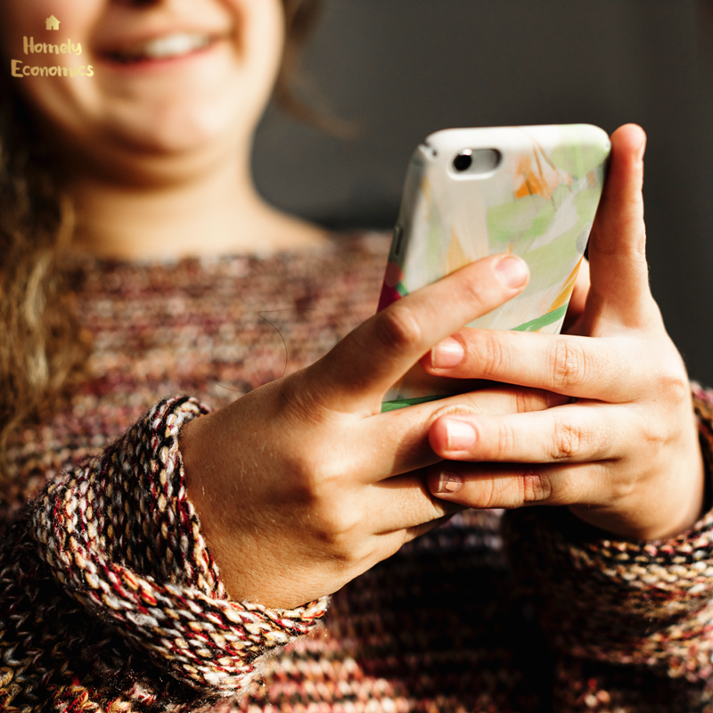 Teenager looking at phone